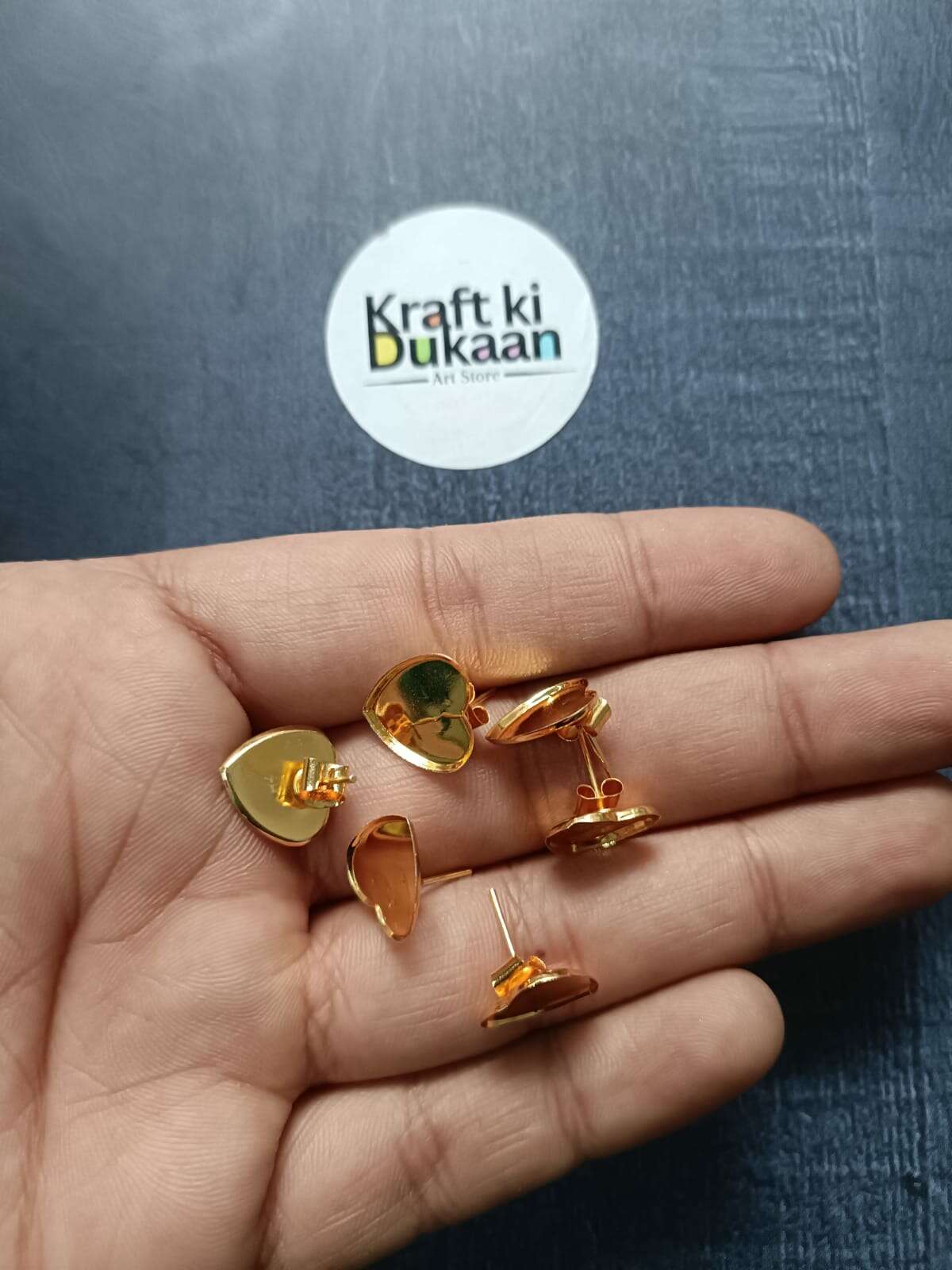 Golden heart-shaped earring bases with gold-tone back posts