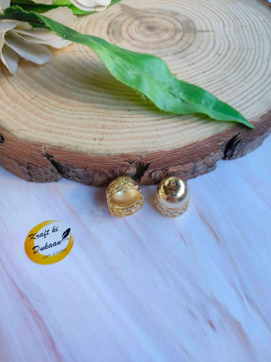 Metal jhumki base pair, gold and silver finish, engraved dome caps