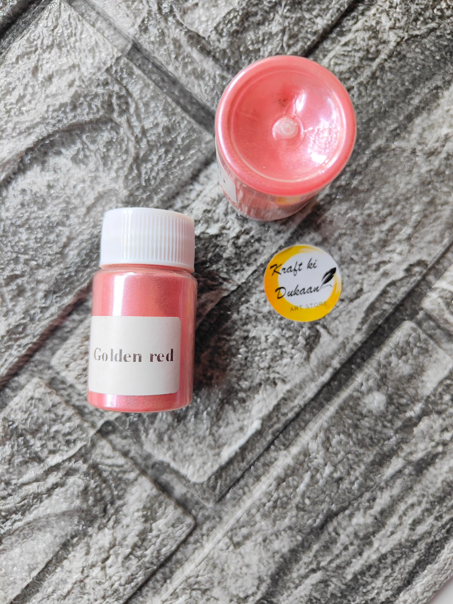 Golden Red Mica Powder for Resin Art in a small bottle from Kraft ki Dukaan