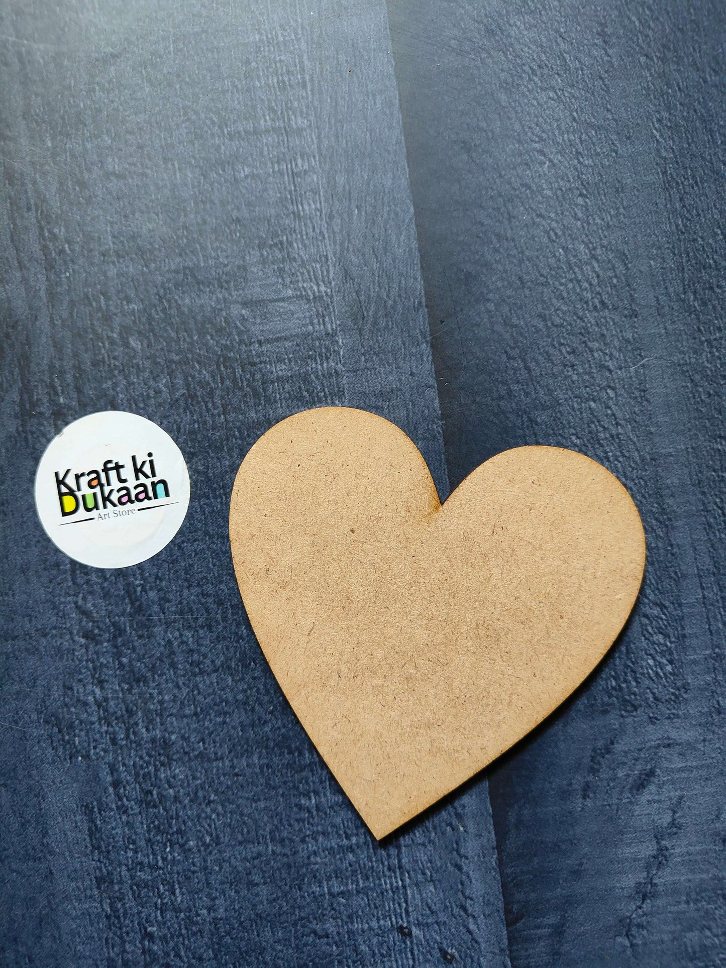 Light tan MDF heart cutout, blank front for crafting