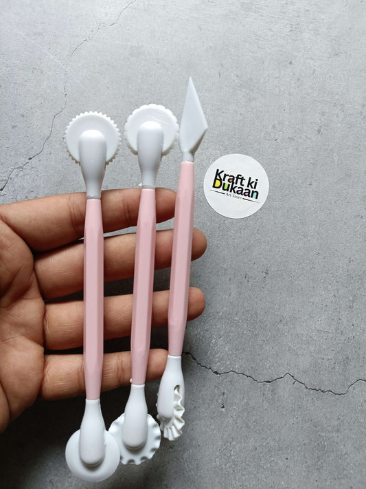 3PC plastic clay tools held in hand—two rounded heads and one triangular tip