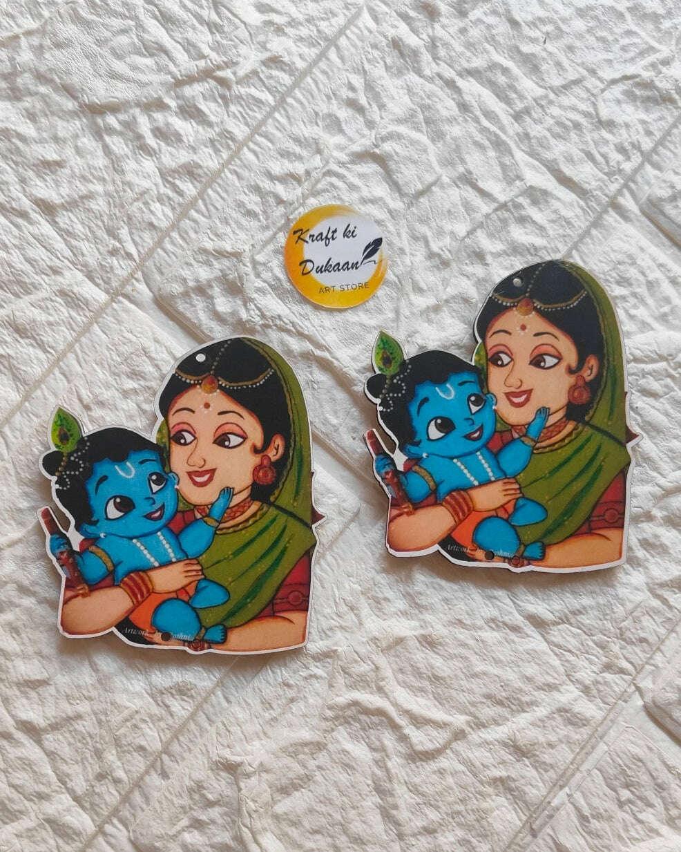 Two rounded MDF cutouts: woman in green sari hugging blue pet