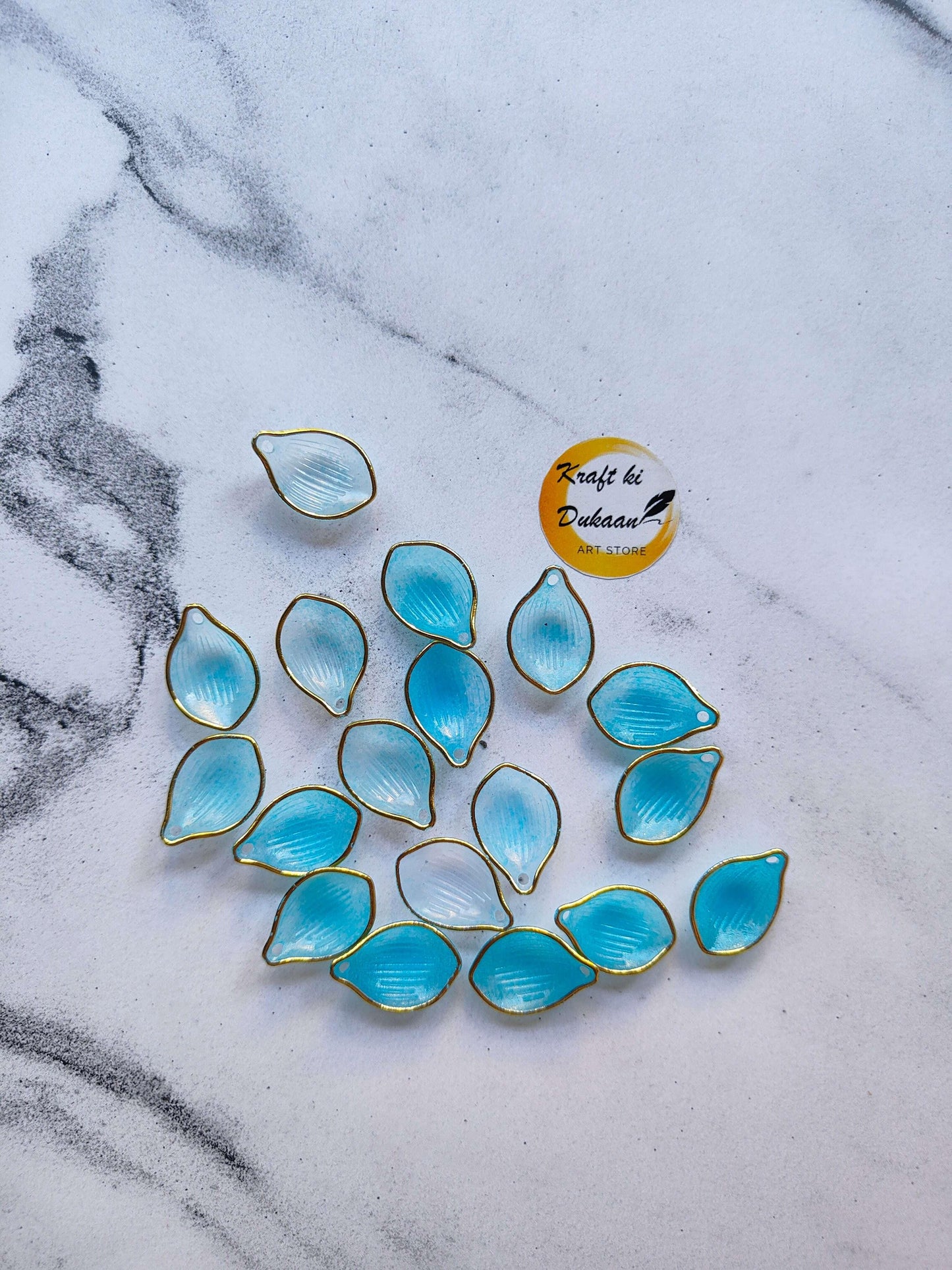 krafthikdukkaan-petal-beads-for-resin-art-light-blue-gold-edged