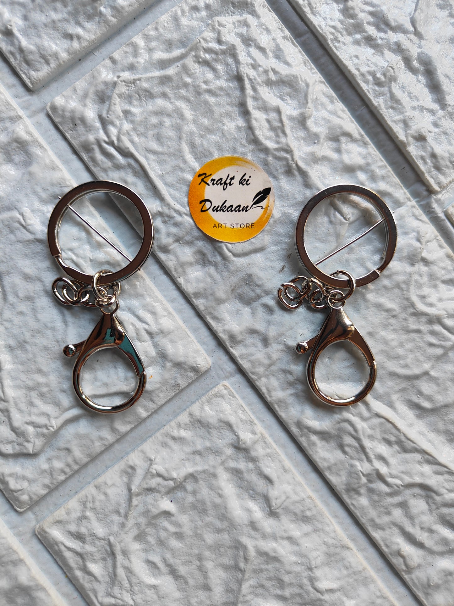 Gold lobster clasp keychain with smooth finish for easy attachment and detachment