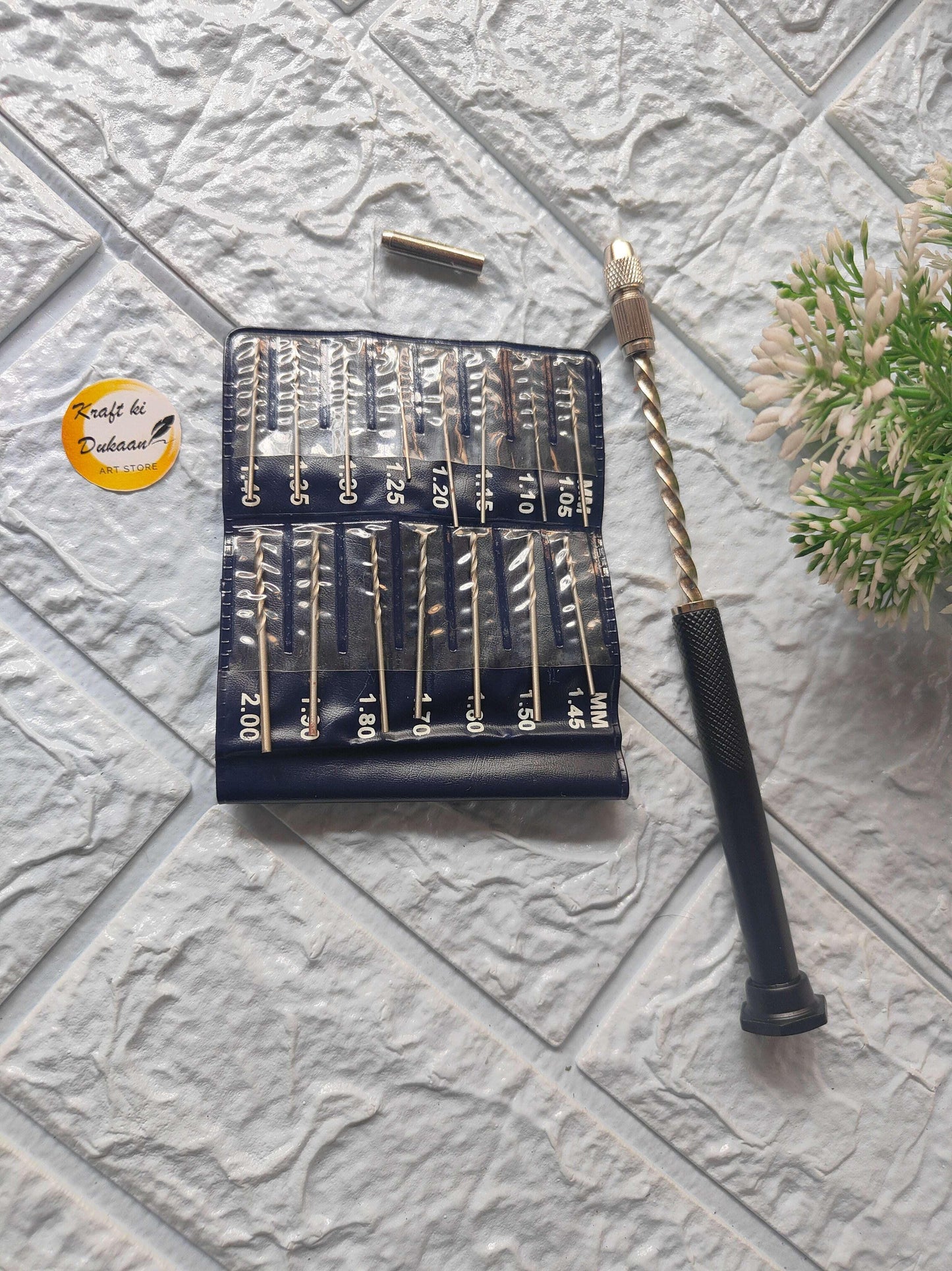 Manual hand drill with rotating handle and bit set in zip fabric pouch