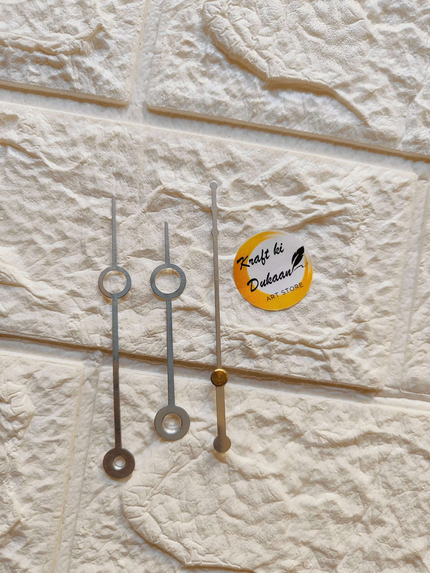 metal-clock-hands-silver-set-with-gold-detail