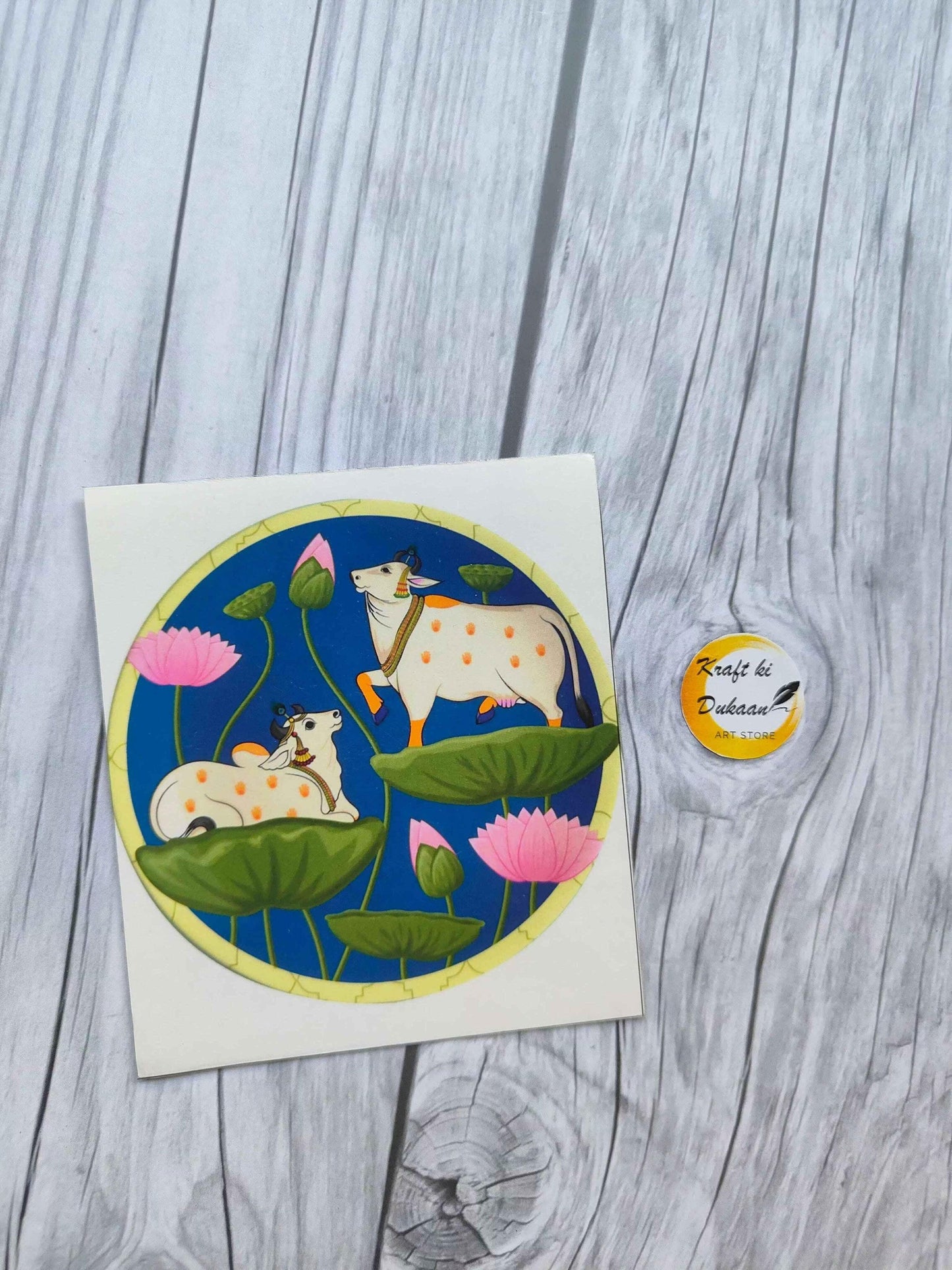 Mini colour sticker sheet with circular cat and dog scene and lotus leaves on white backing
