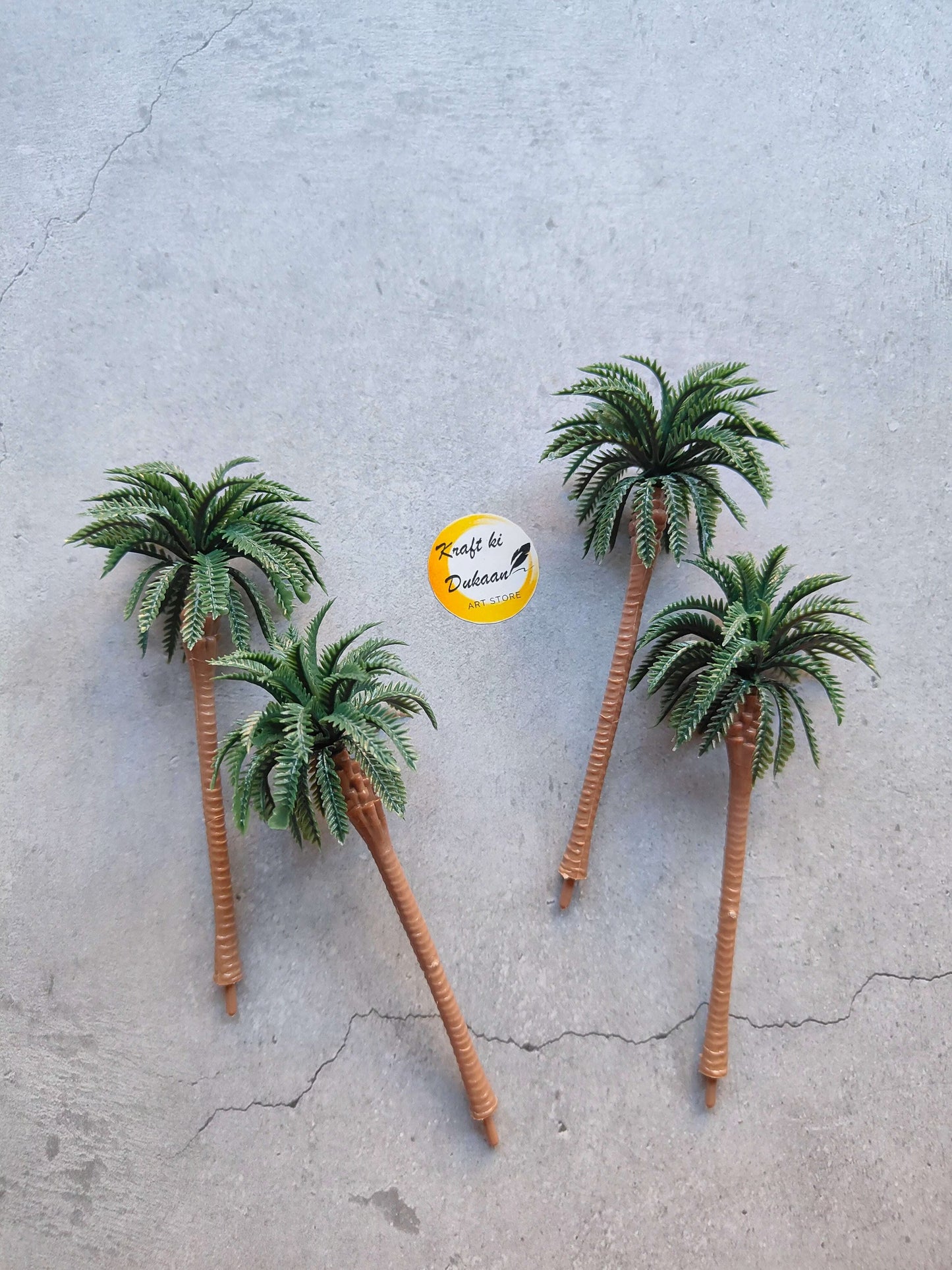 miniature-palm-tree-model-set-of-four-artificial