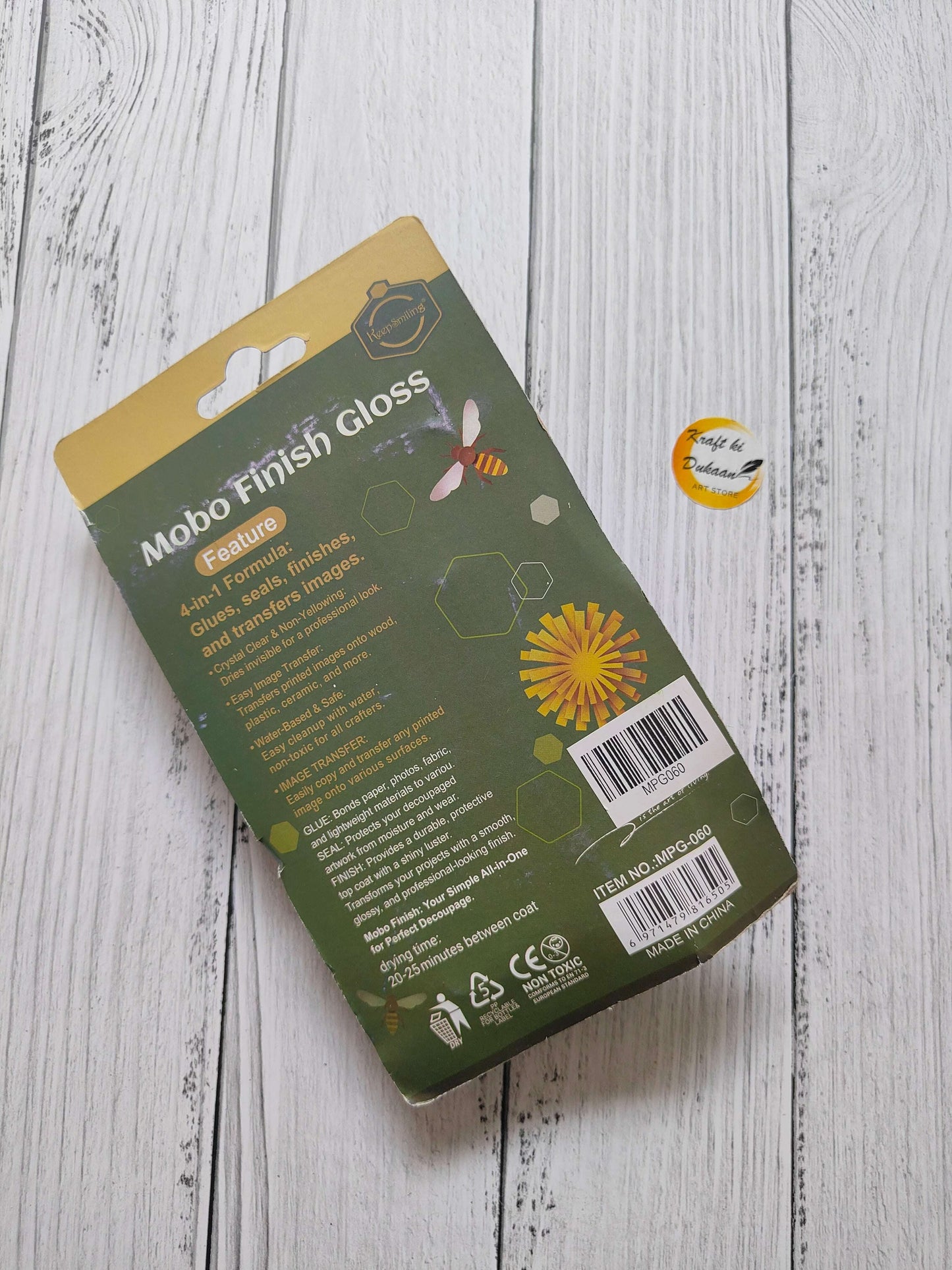 Mod Podge Gloss 60ML package back label with hex graphics and details