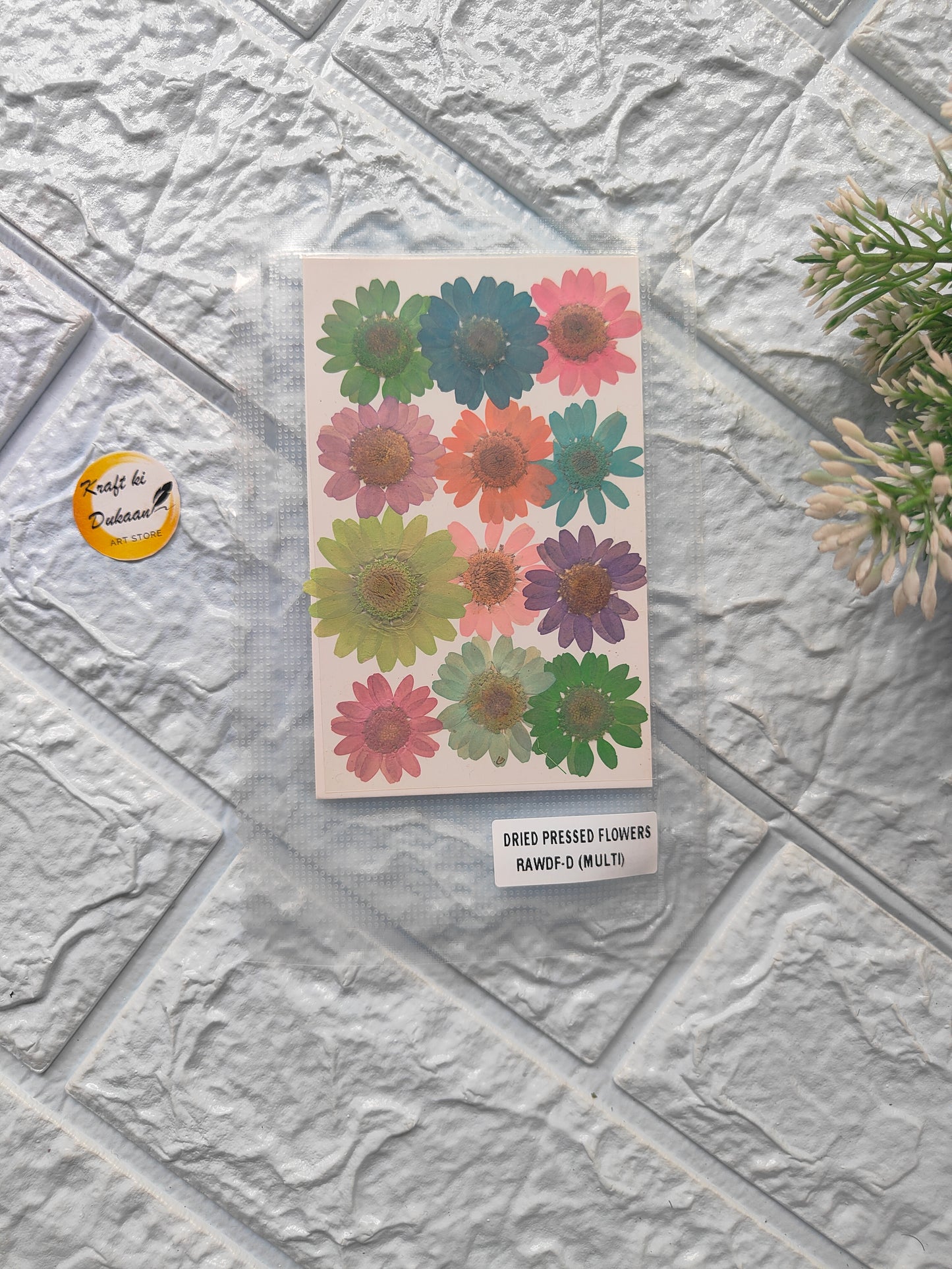 Kraft ki Dukaan multi-color pressed flowers art print featuring vibrant floral designs on a textured background