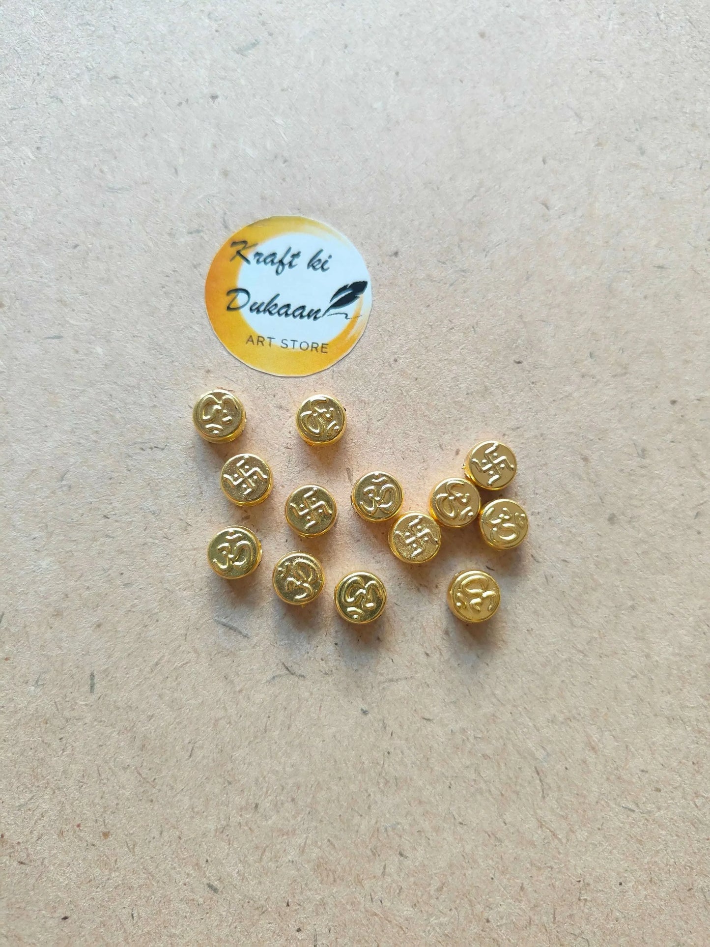 om-swastik-beads-for-jewelry-making-collection-on-paper