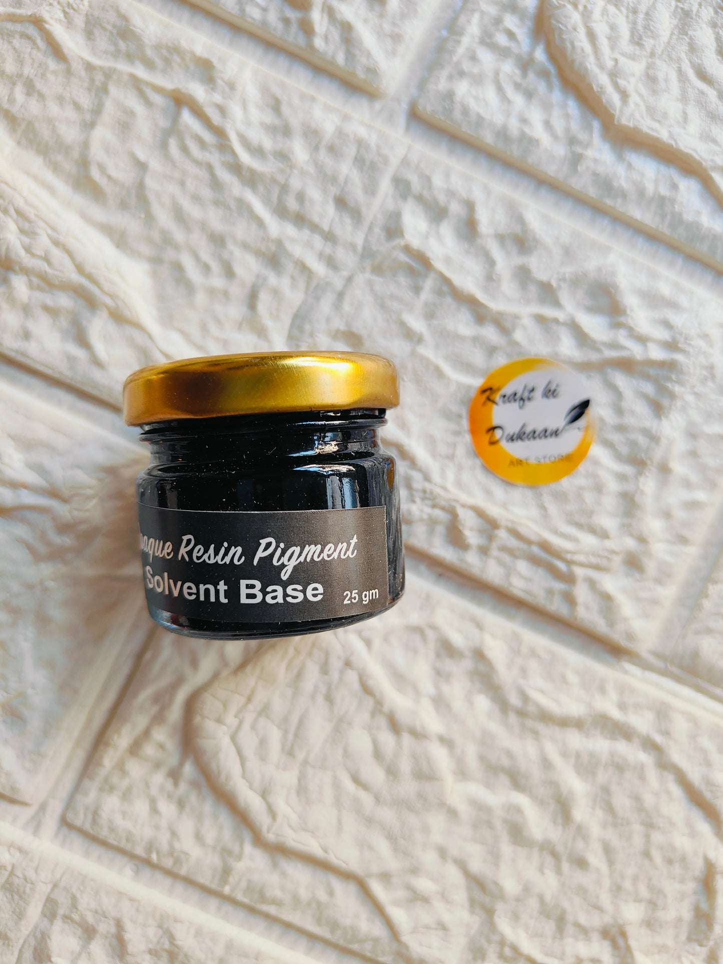 25 gm opaque pigment for resin in a glass jar with a gold lid from Kraft ki Dukaan