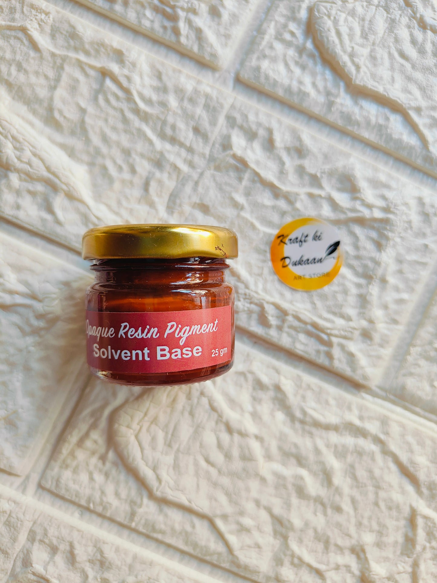 Opaque pigment for resin in a jar with a golden lid, perfect for vibrant resin art projects