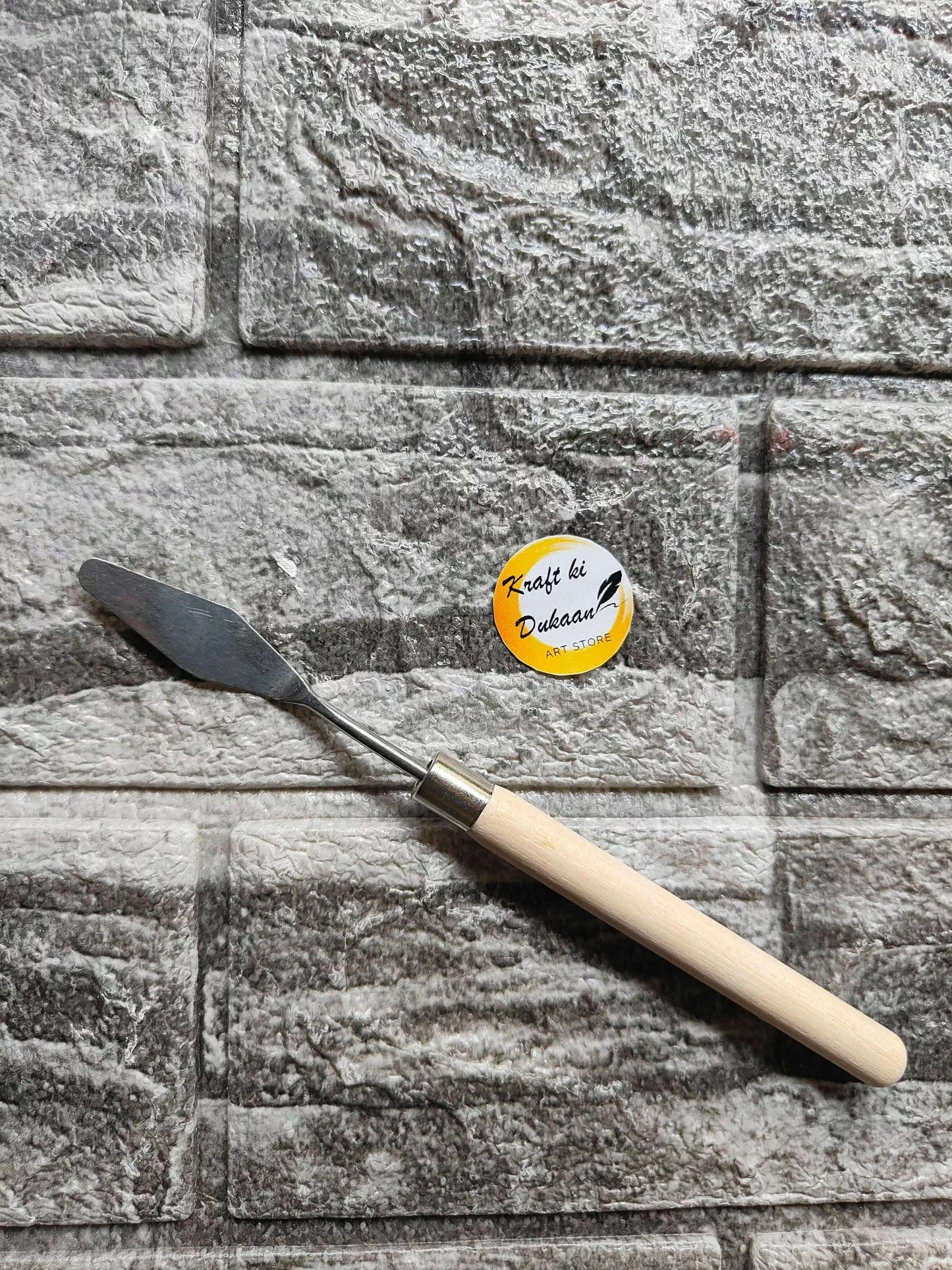 Painting knife A13 with dark metal blade and light wooden handle