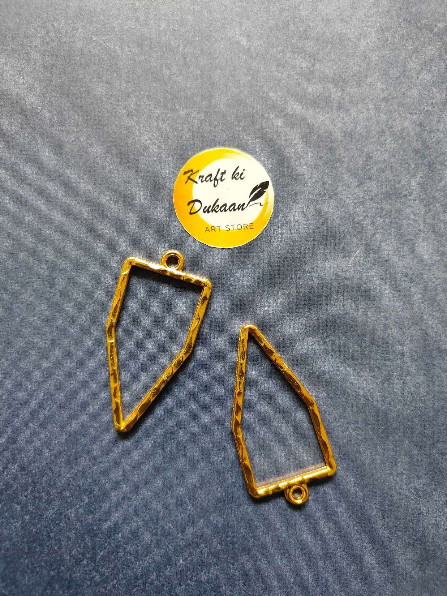 Pentagon bezel pendant pair in gold tone, open-back bezel with top loop