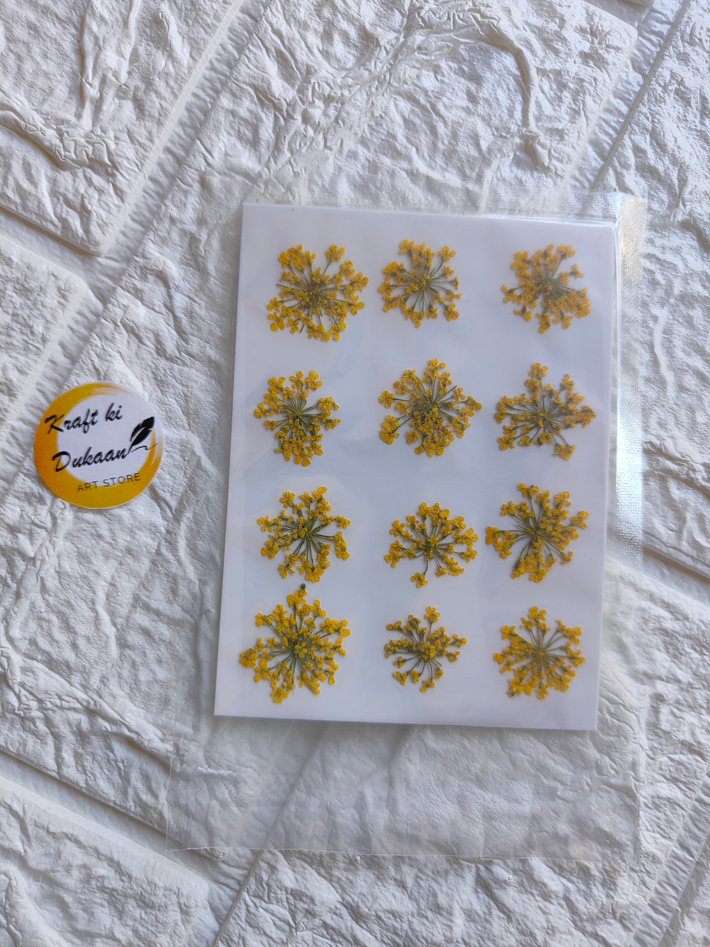 Kraft ki Dukaan pressed flower art supplies including vibrant yellow flowers for crafting projects