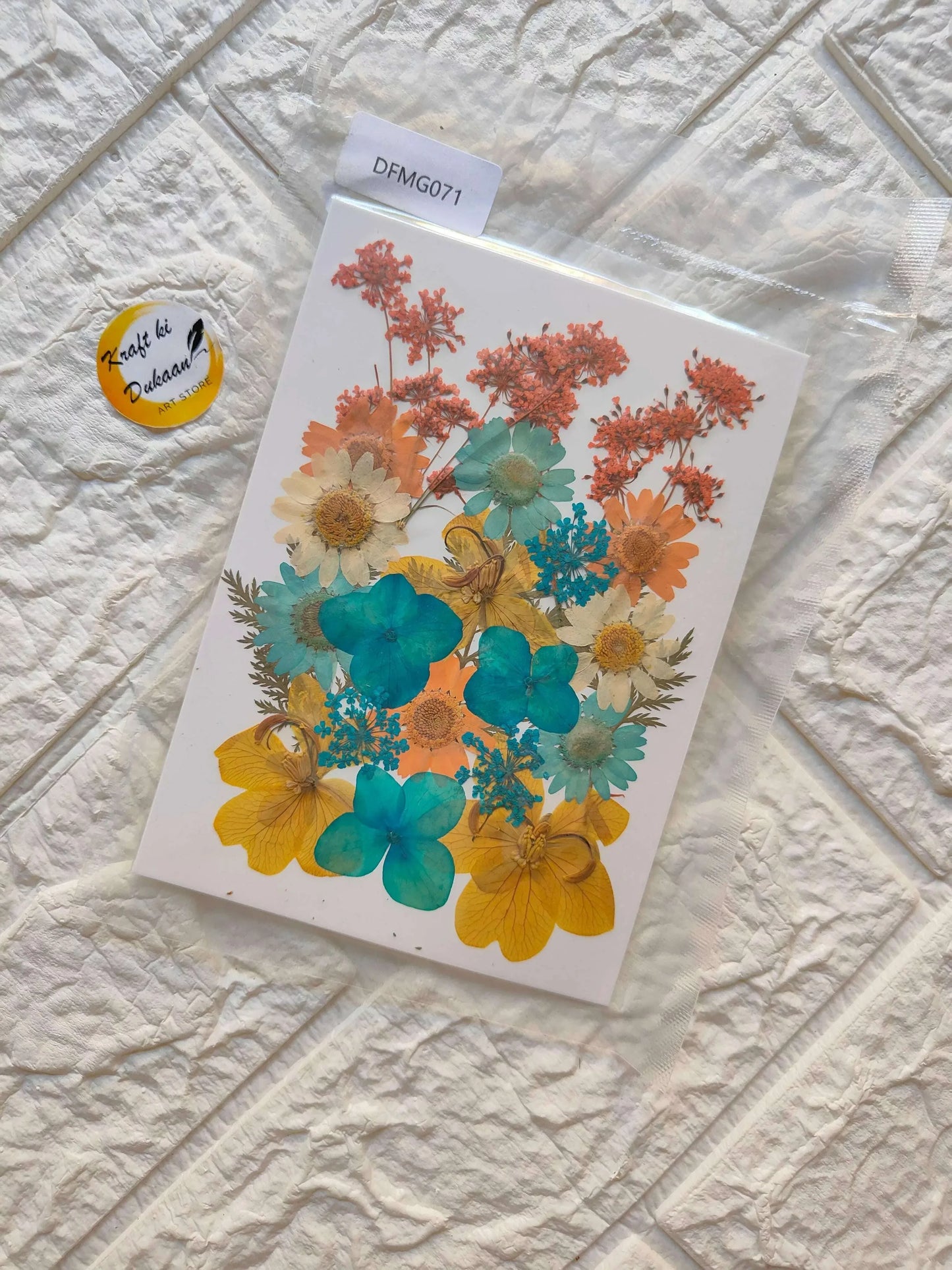 Pressed Flower Sheet Mix B13 with layered orange, blue and teal pressed blossoms