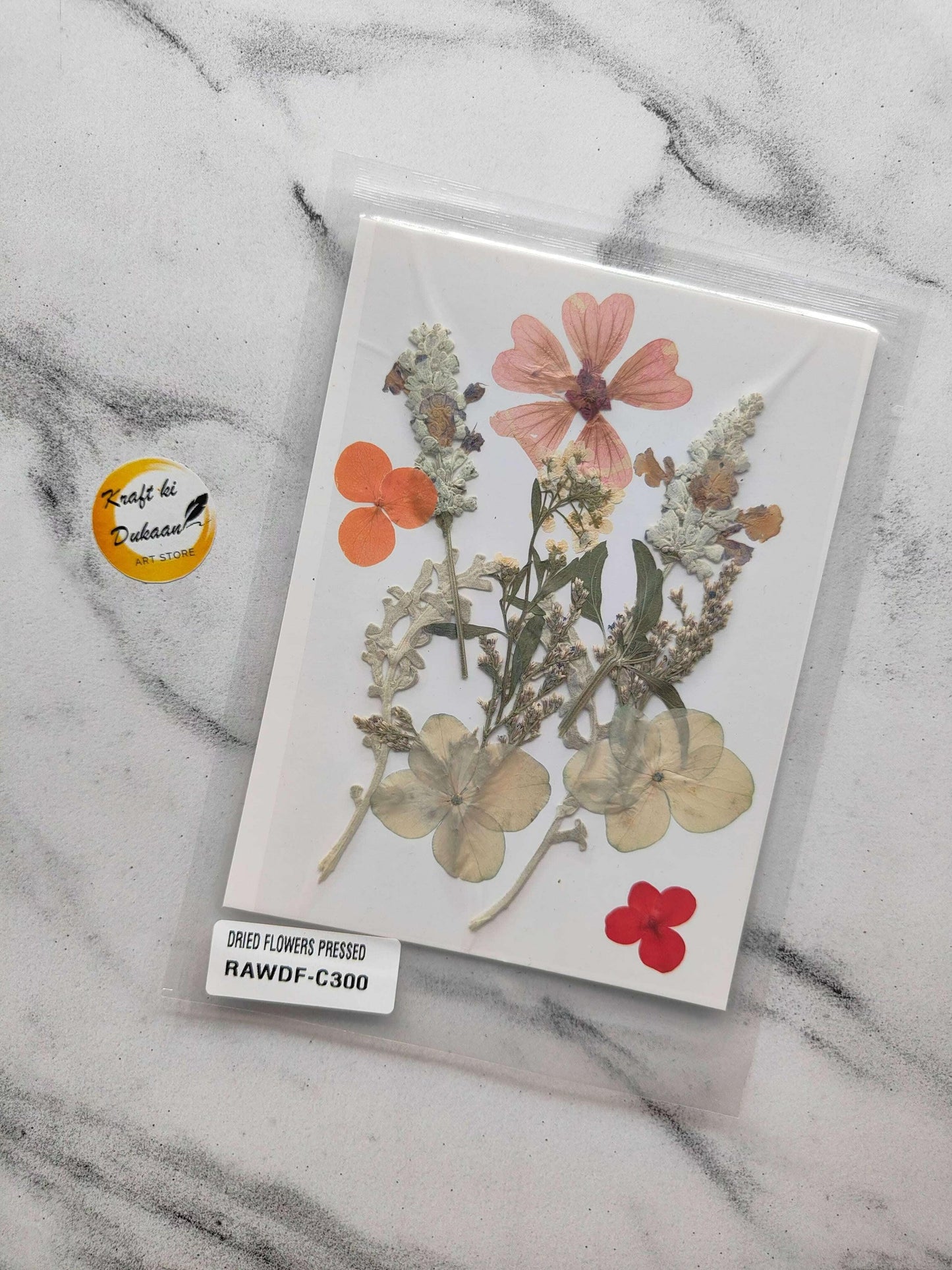 Pressed flower sheet mix F3 with dried floral pieces, butterflies and blossoms on white card