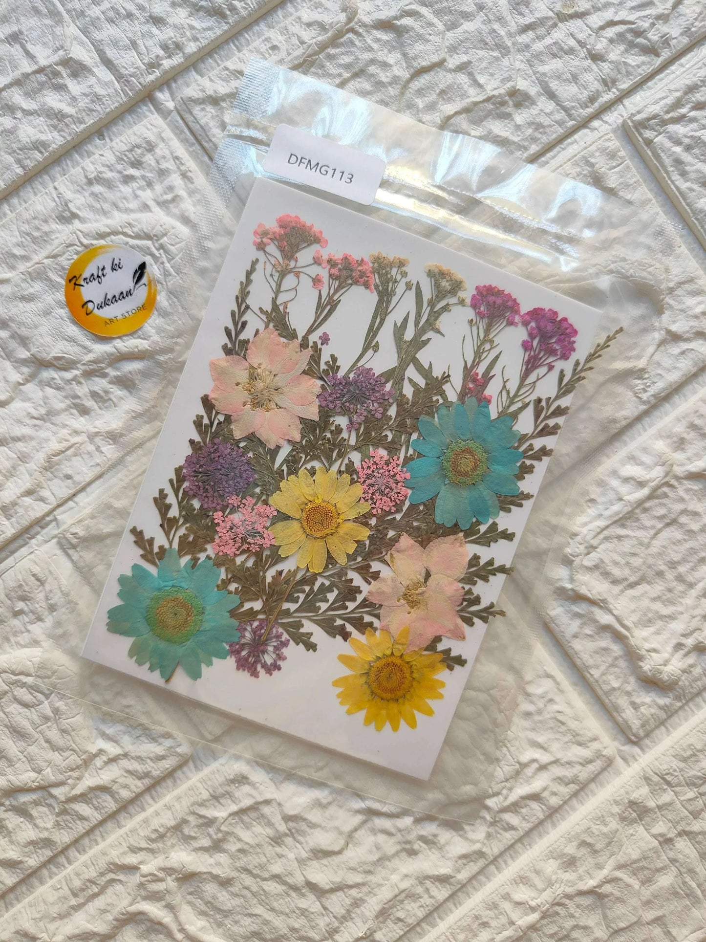 Pressed Flower Sheet Mix B24—pressed flower petals in pastel mix (pink, teal, yellow).