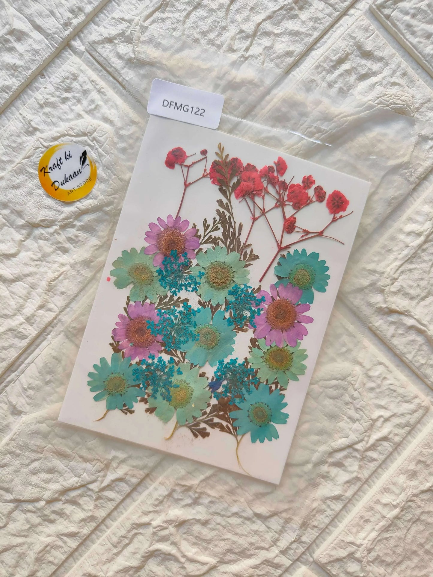 Pressed Flower Sheet Mix B18 with teal, purple, and red dried flowers on a sheet