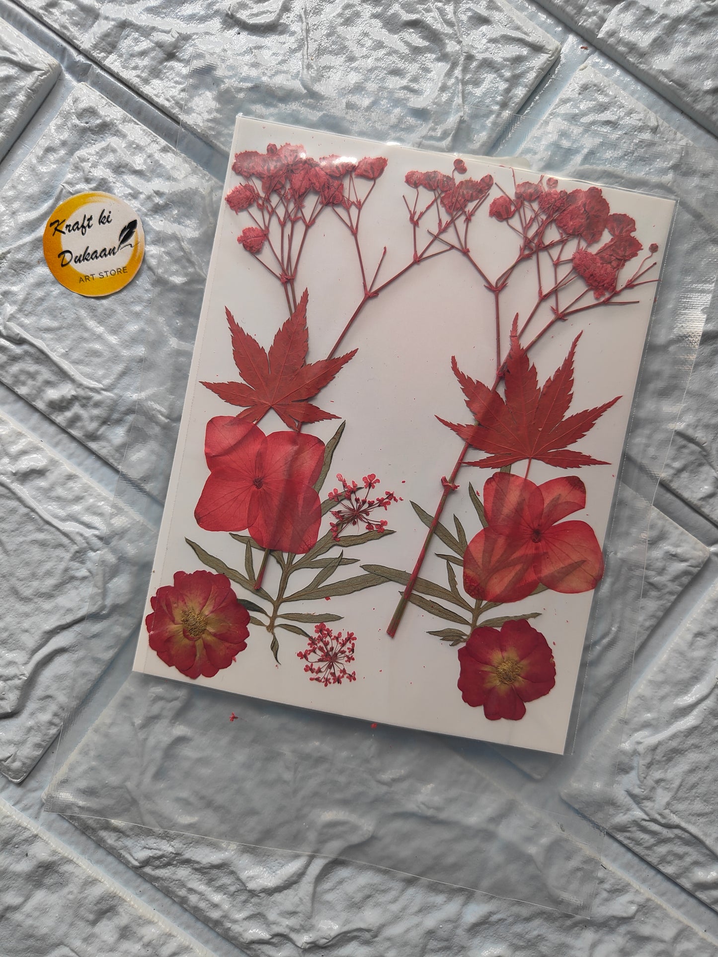 A7 pressed flower sheet featuring vibrant red flowers and delicate leaves for crafting and decoration