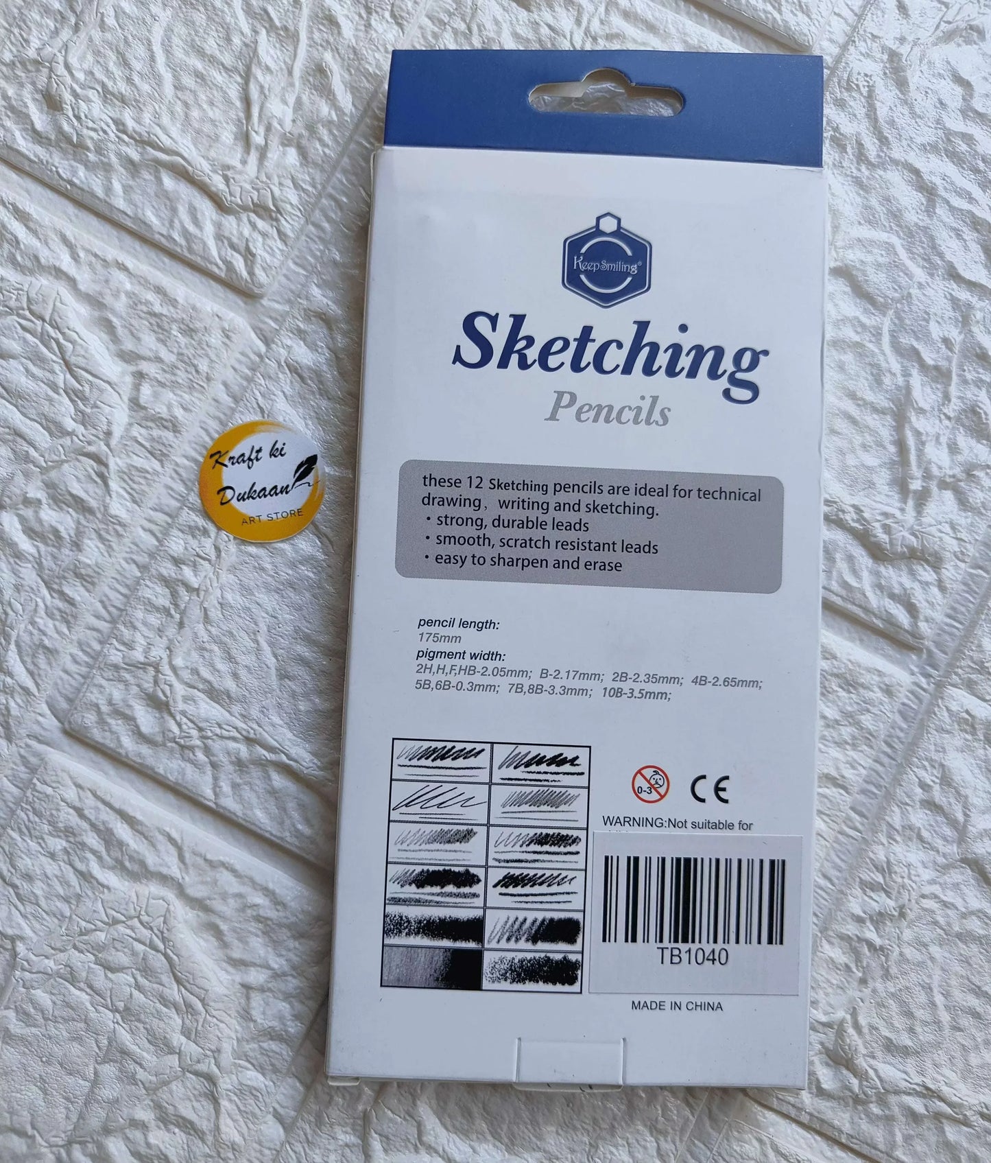 Back of sketching pencils 12-pack box with specs, lead grades, warning, and CE mark