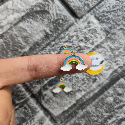 Rainbow cloud charm with enamel stripes and gold-tone ring, close-up