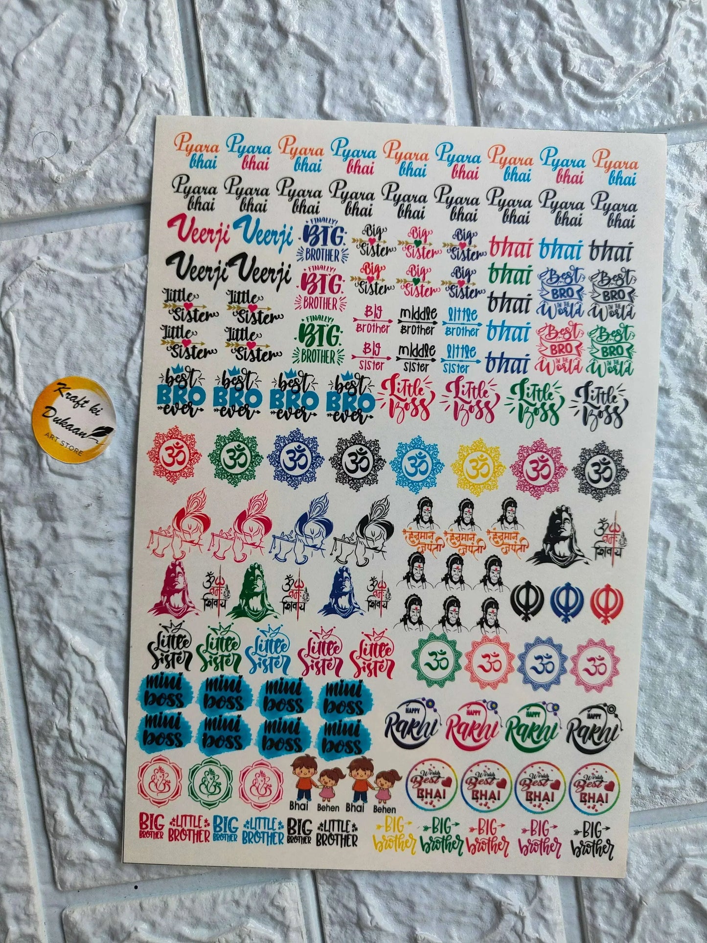 Colorful rakhi sticker sheet featuring various designs like symbols and text for festive celebration