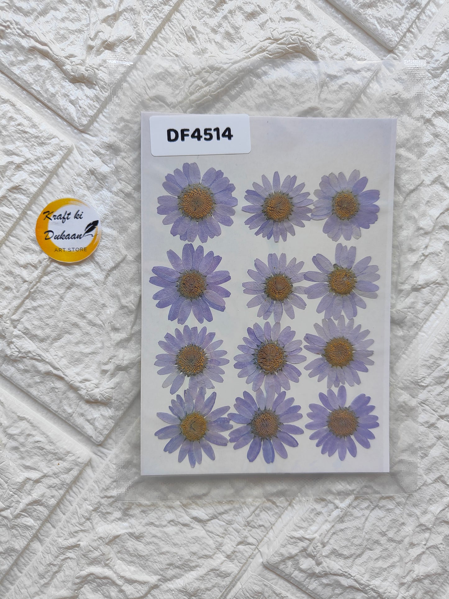 Real daisy flower sheets featuring twelve lavender daisies on a clear background