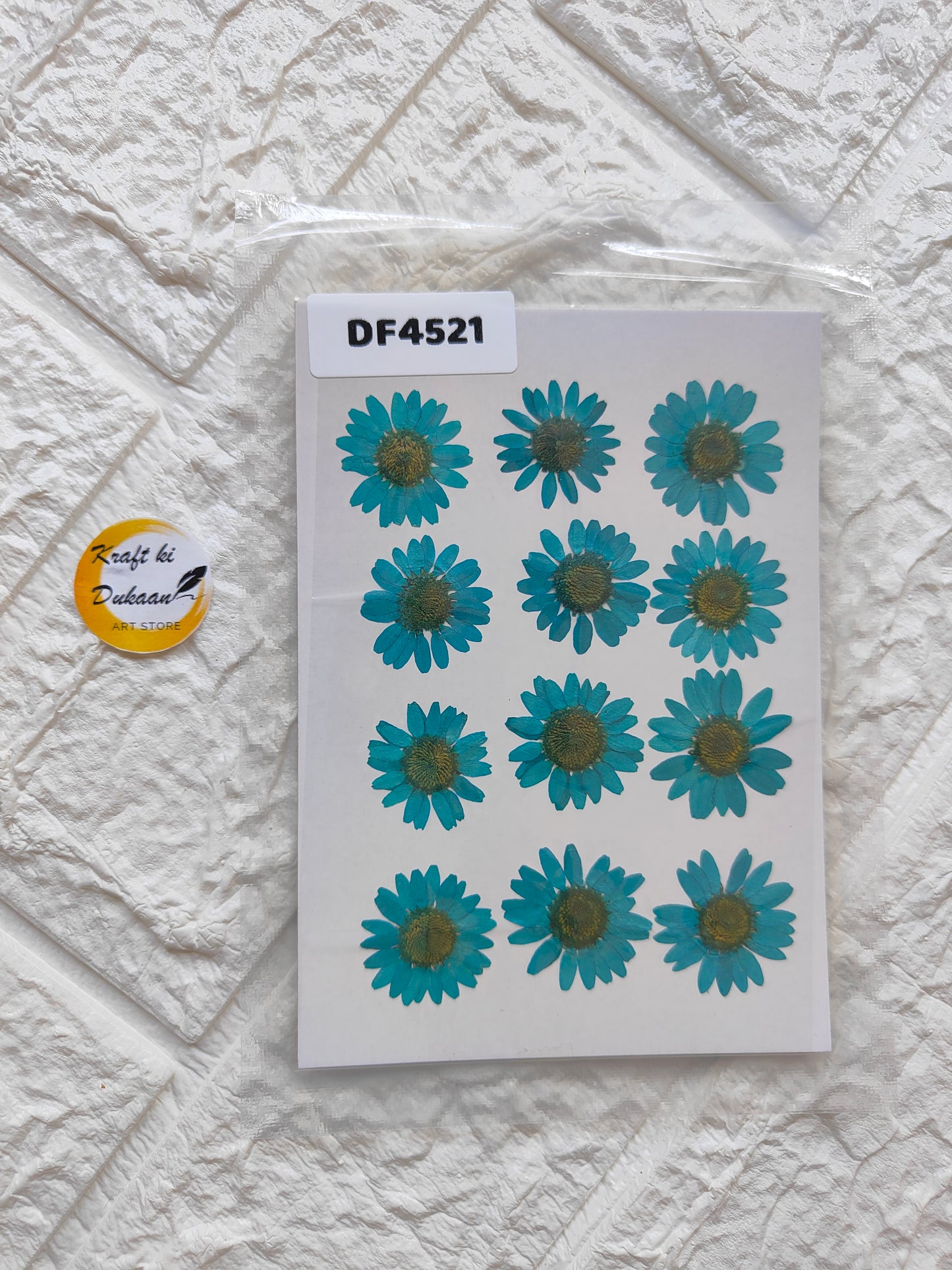 Real daisy flower sheets featuring vibrant blue daisies in an appealing arrangement