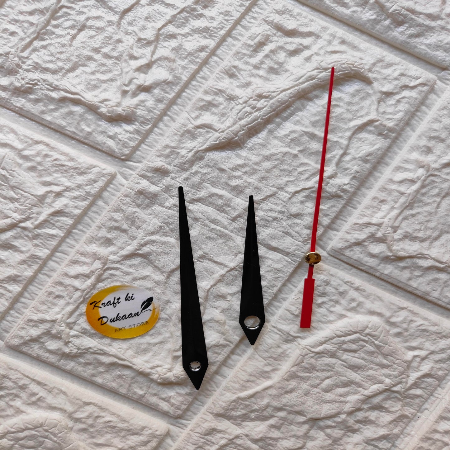 Red and black clock hands set by Kraft ki Dukaan for DIY clock projects