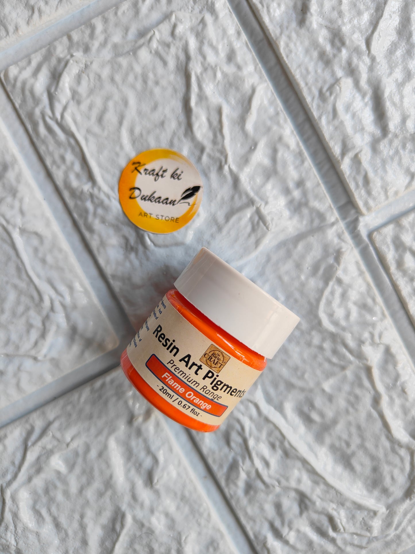 Kraft ki Dukaan opaque pigment for resin art in orange jar for vibrant color mixing