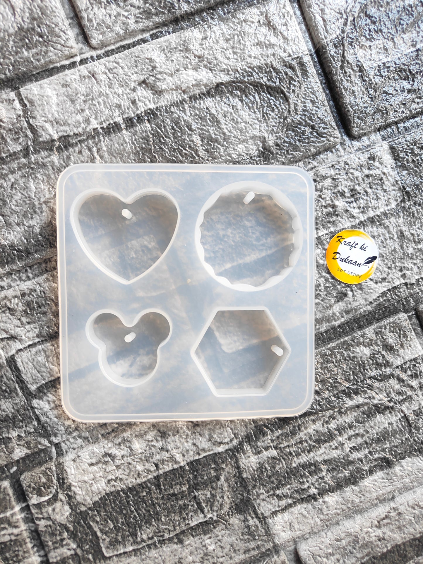 Silicone resin keychain mould with heart, circle, hexagon, and bear designs for crafting keychains