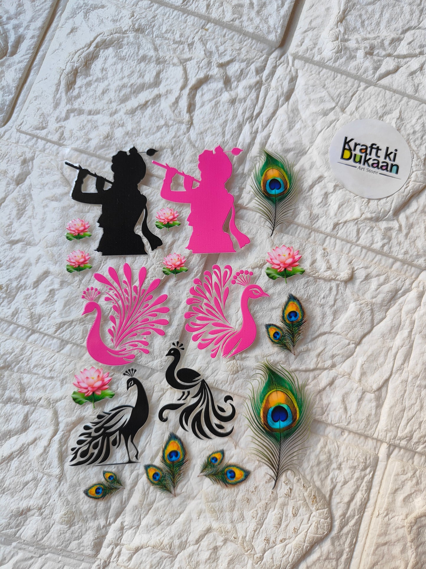 Peel-off sticker sheet with black, pink floral designs and peacock feather decals