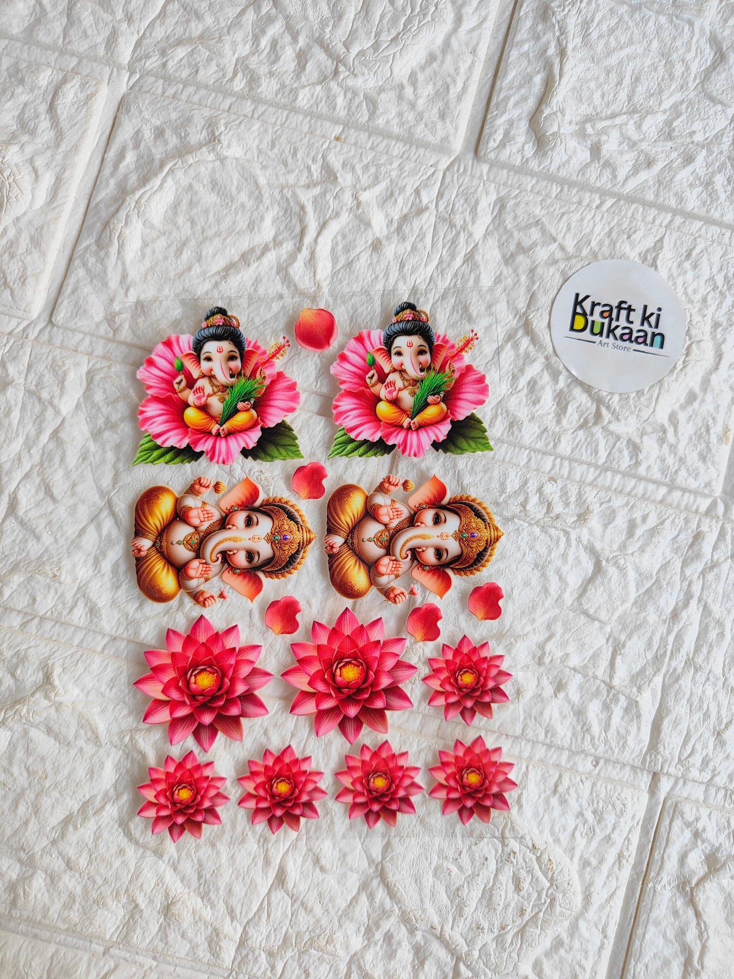 Peel-off sticker sheet with pink floral and Ganesh-style decorative motifs