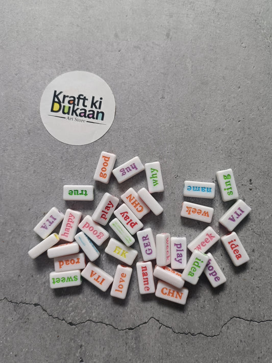 Rakhi bracelet beads with white square alphabet blocks and multicolor message beads