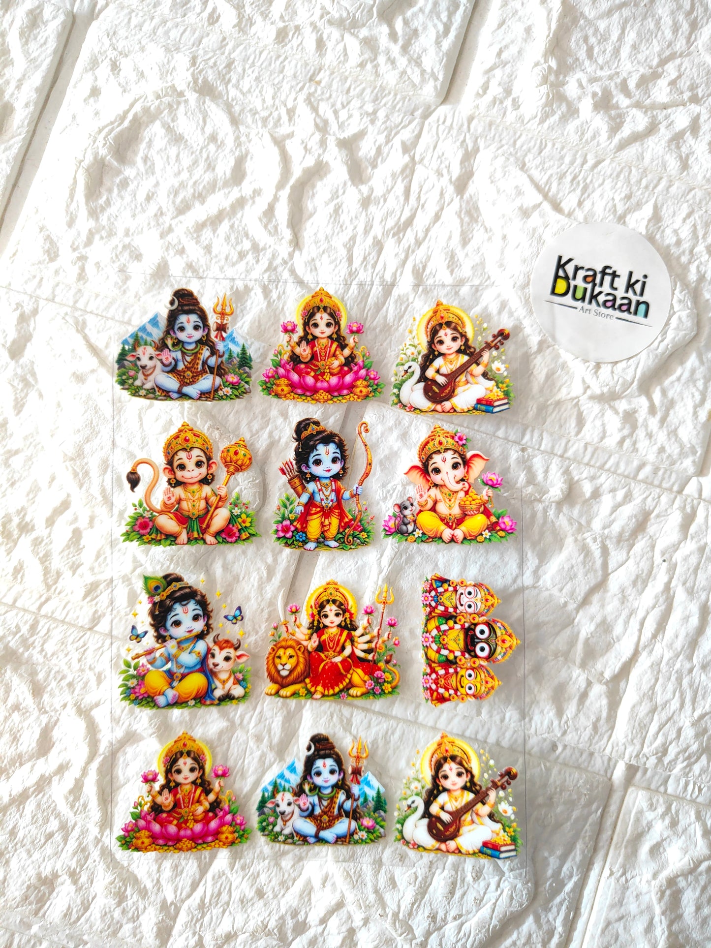 UV DTF peel-off sticker sheet with 10 colorful cartoon deity figure decals