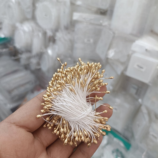Gold artificial pollen spray with clustered bead-like florets and wire stems