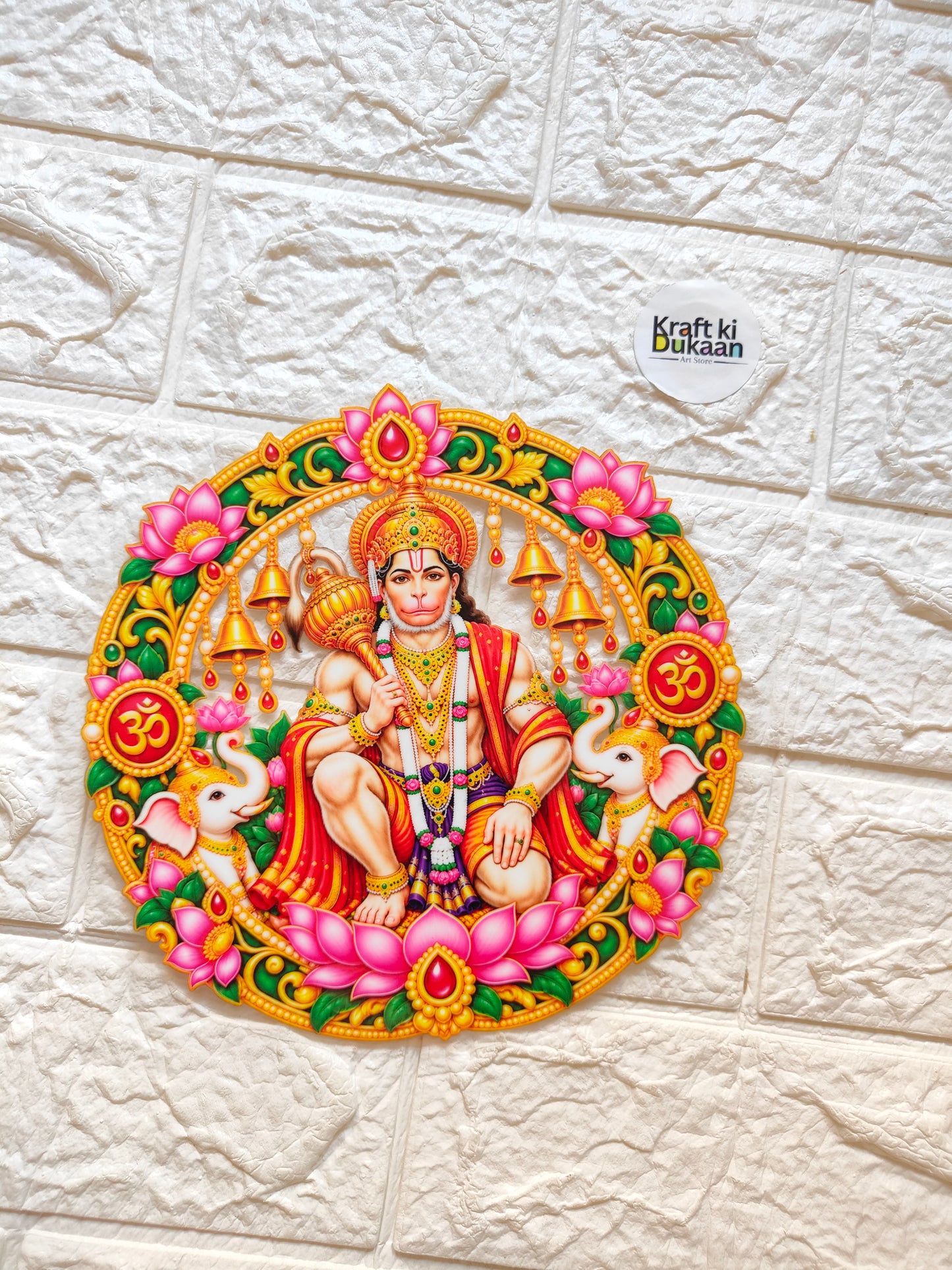 Round peel-off sticker with ornate Hindu deity design in vibrant orange, pink, and gold