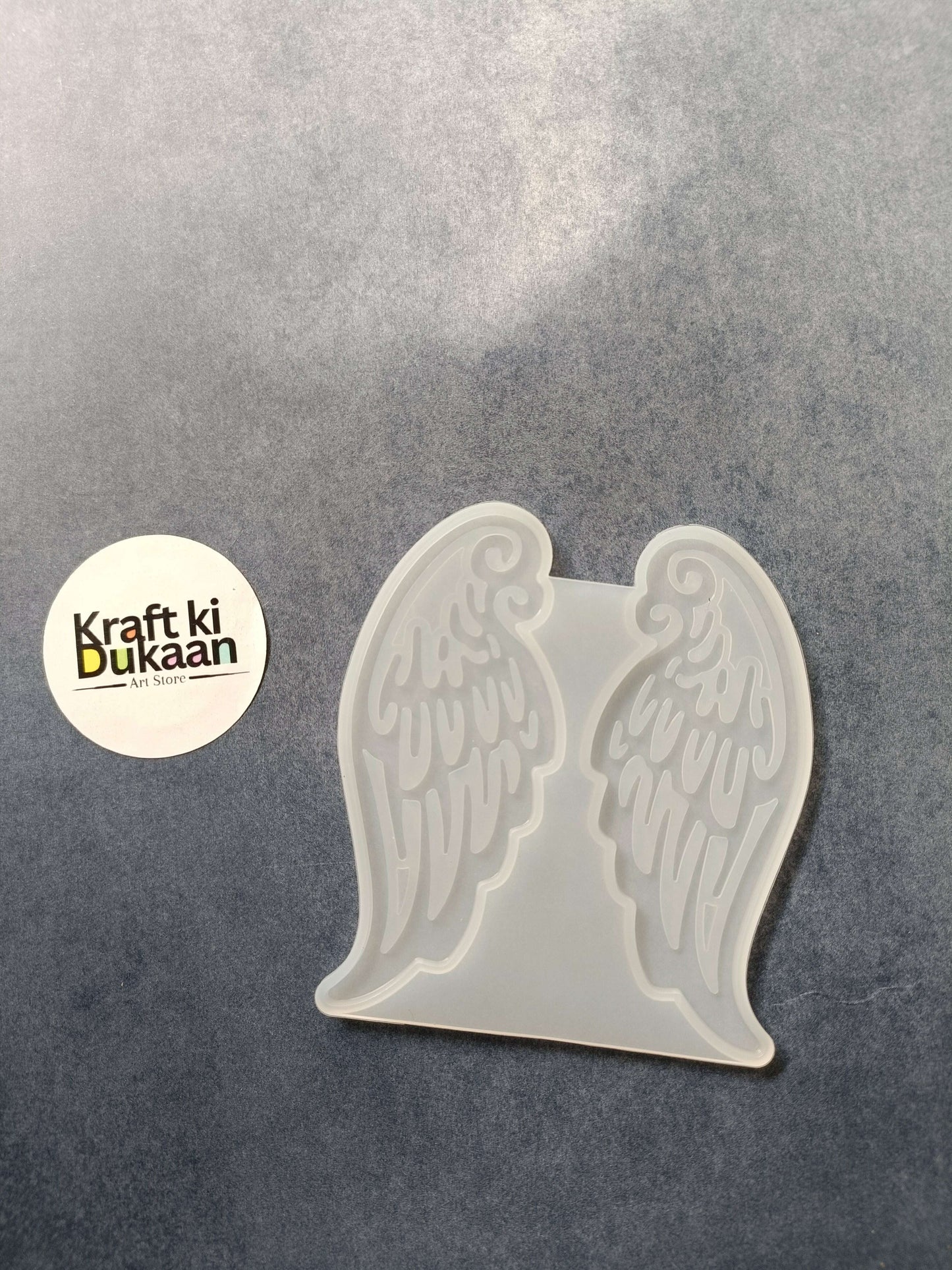 Clear plastic angel wings mould with two cavity design
