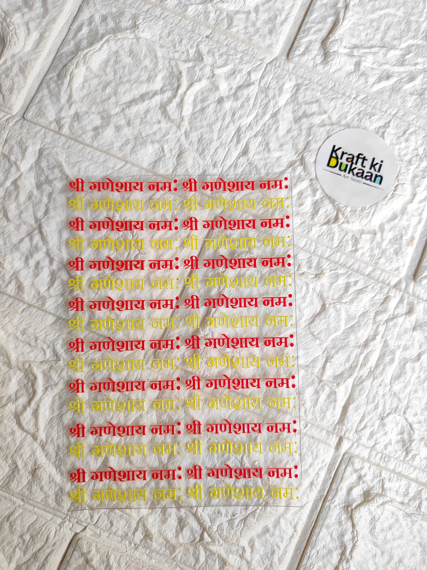 Peel-off sticker sheet with orange Hindi text arranged in a grid