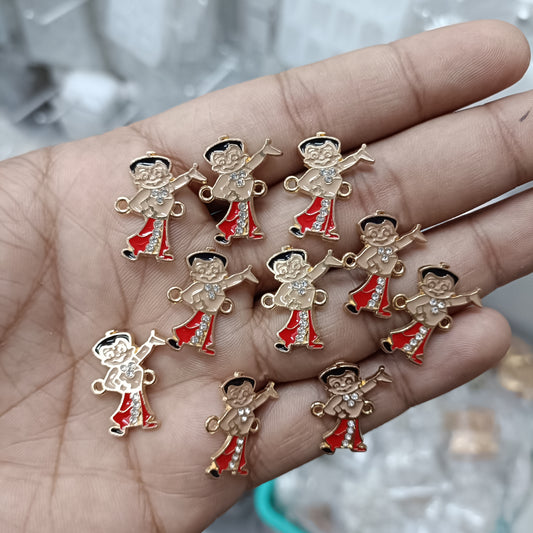 Set of 10 gold-tone rakhi bracelet pendants, cartoon boy charms with red enamel outfits