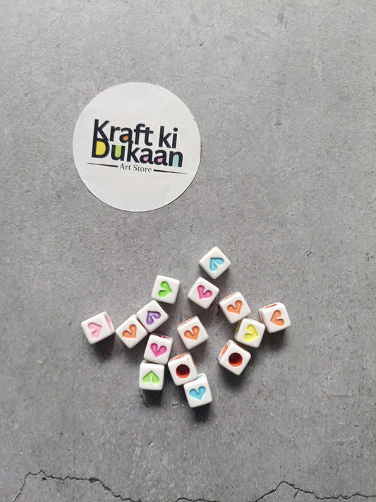 Rakhi bracelet bead pack of 25 cube beads with heart icons, mixed pastel colors