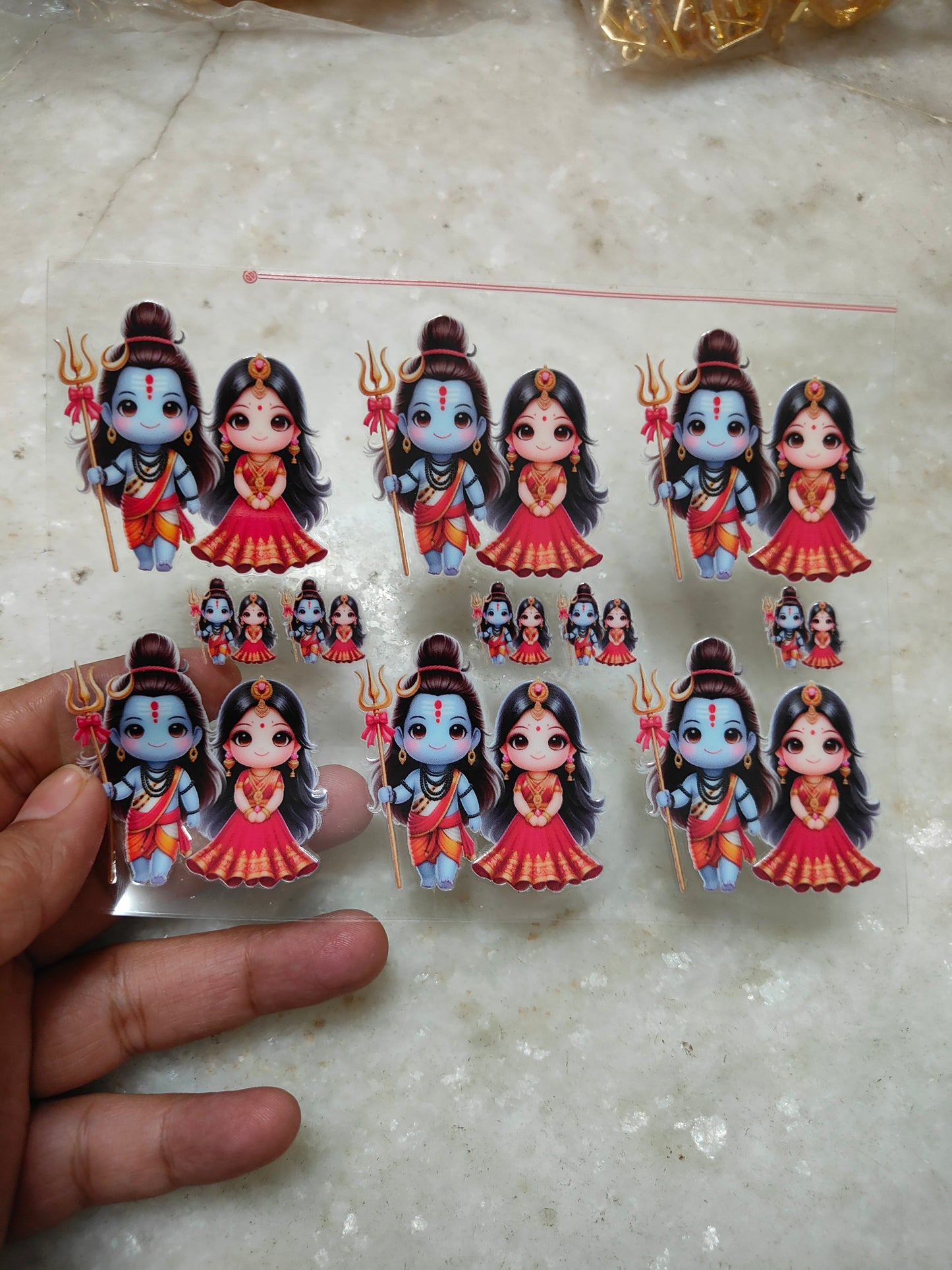 Peel-off sticker sheet with cartoon girls in flame outfits, multiple cutout stickers