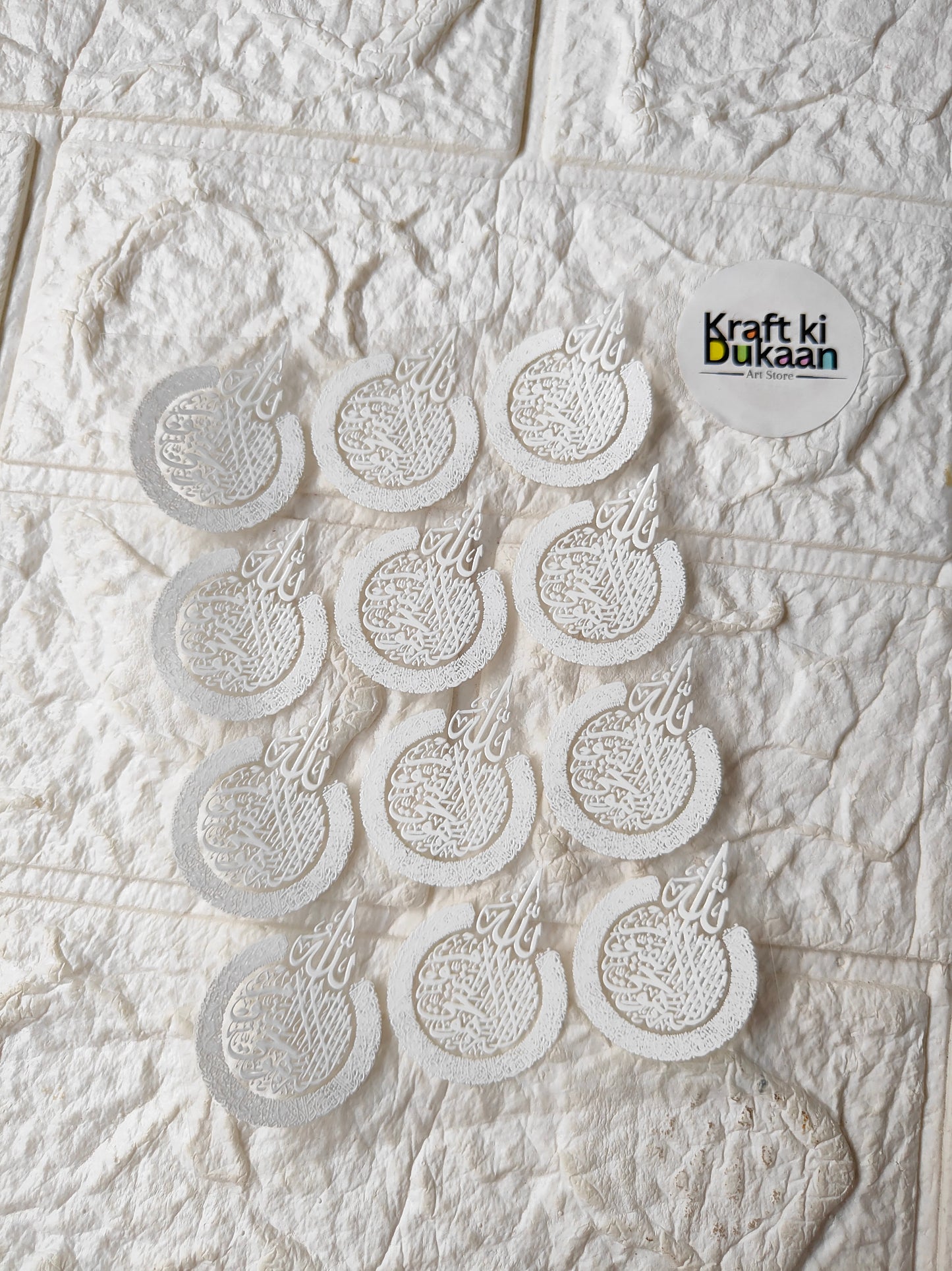 Peel-off sticker sheet with gray circular designs and small text stickers