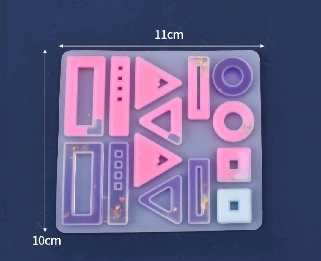 14-cavity jewelry mould with rectangle, triangle, circle and square cavities, pink