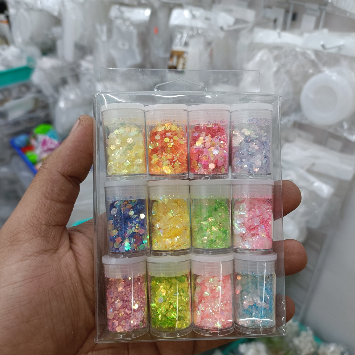 Hexagon holo sequin set in clear organizer with multi-color glitter hex pieces