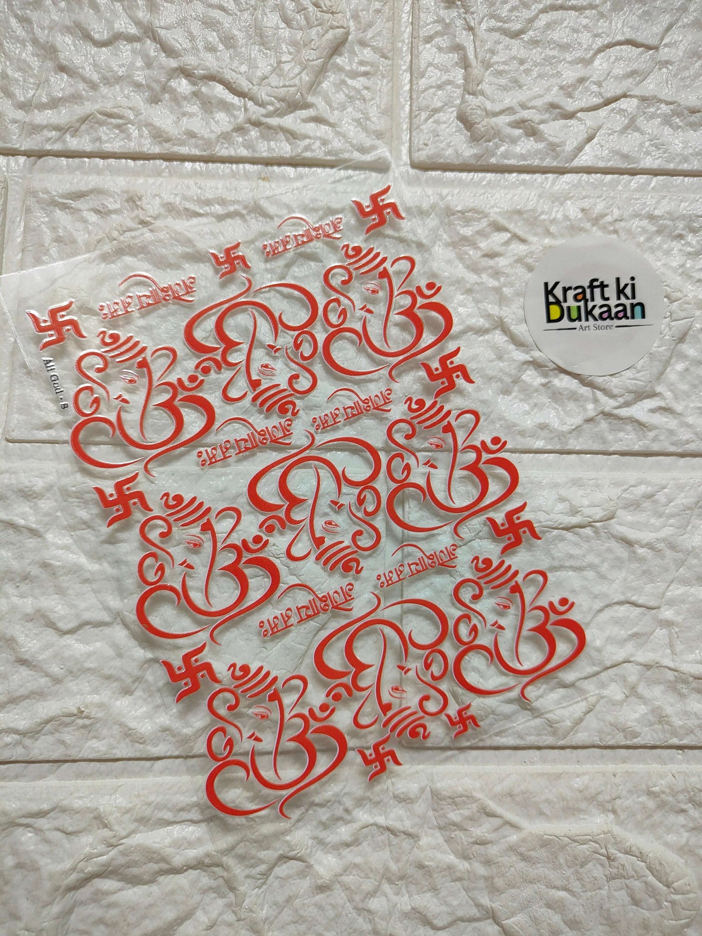 UV DTF peel-off sticker sheet with red decorative swirl designs