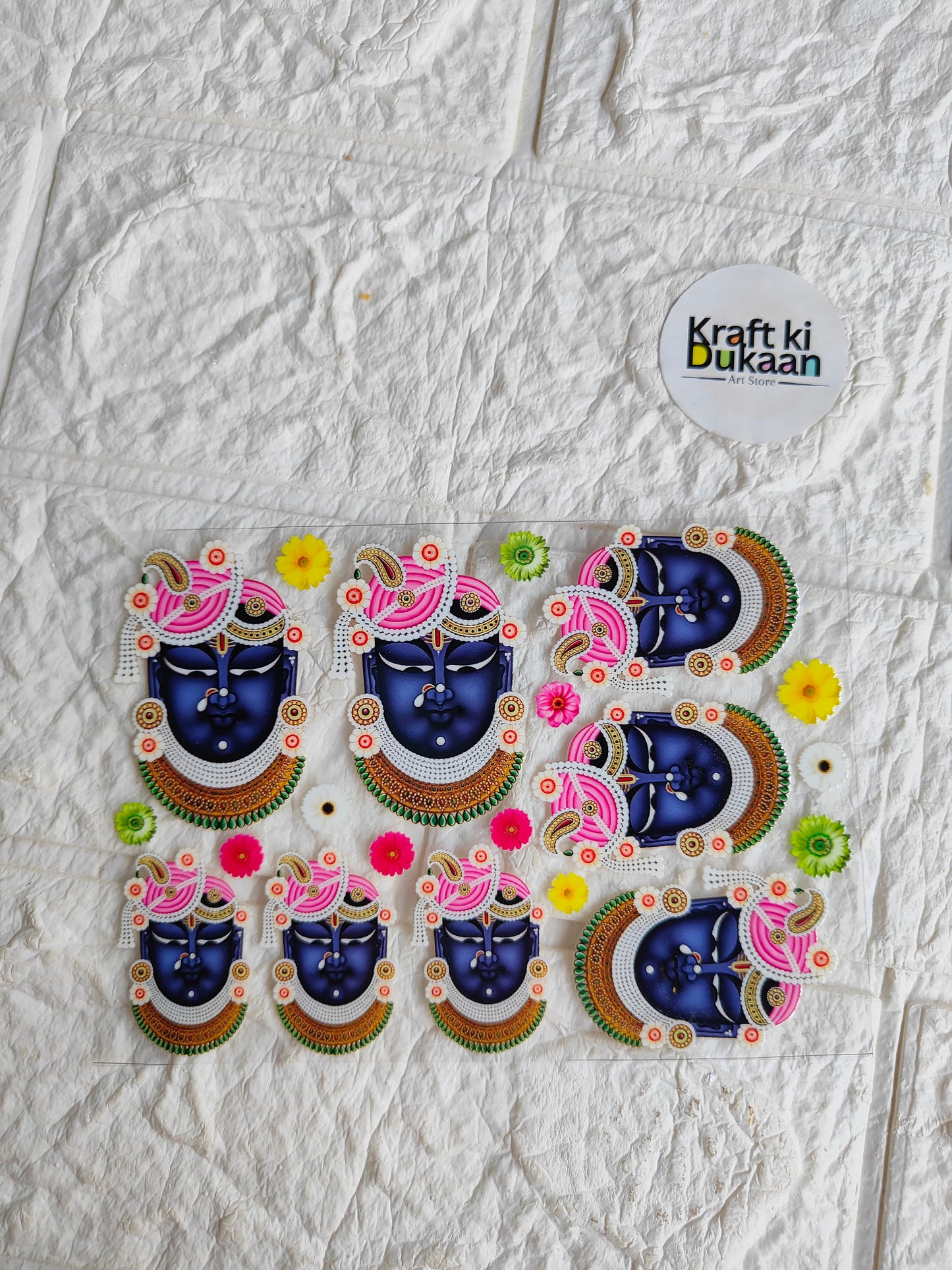 UV DTF peel-off sticker sheet with multiple colorful decorative stickers, blue motif and floral details