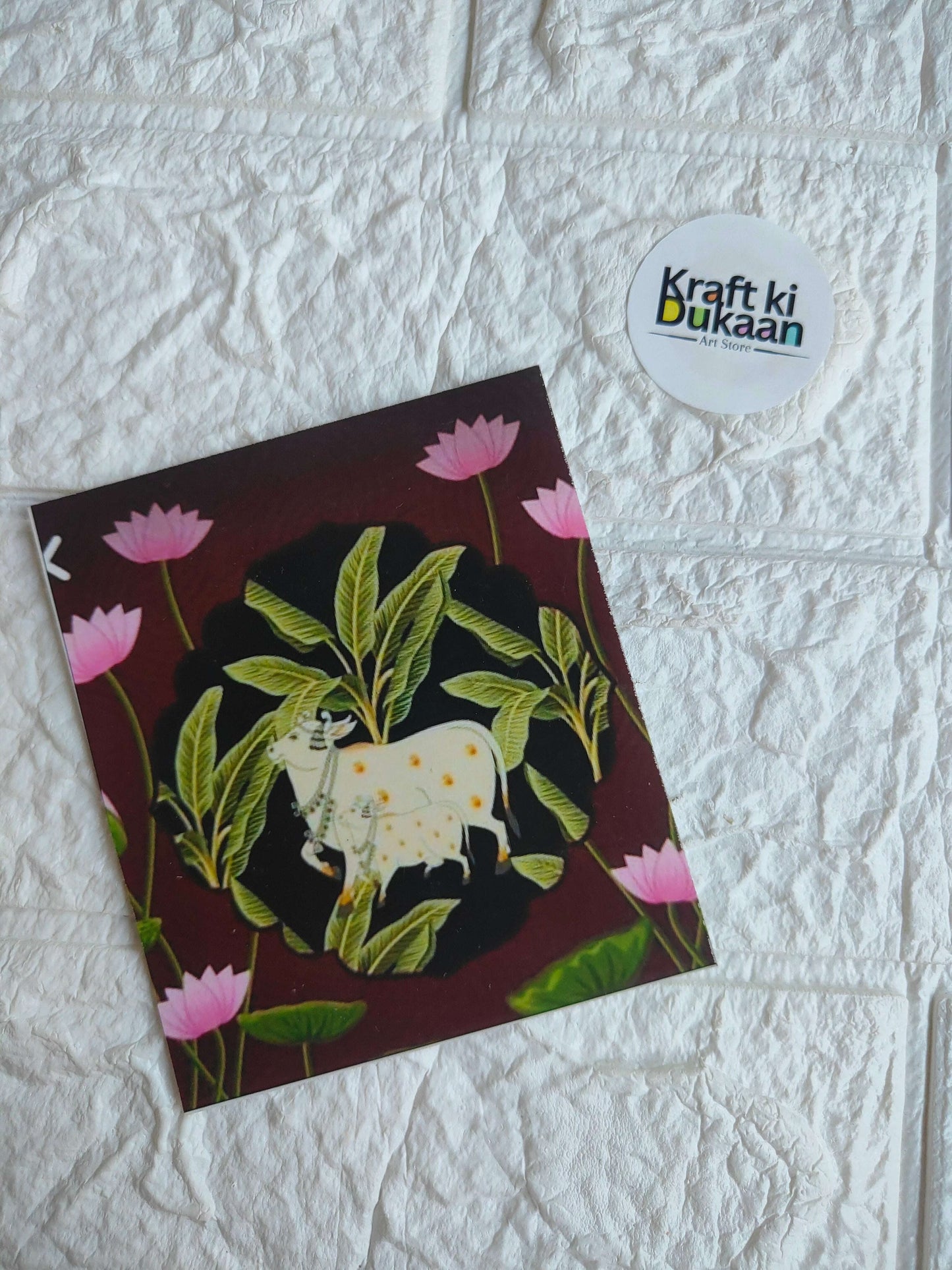 Square sticker sheet with dark background, pink flowers, and white elephant illustration